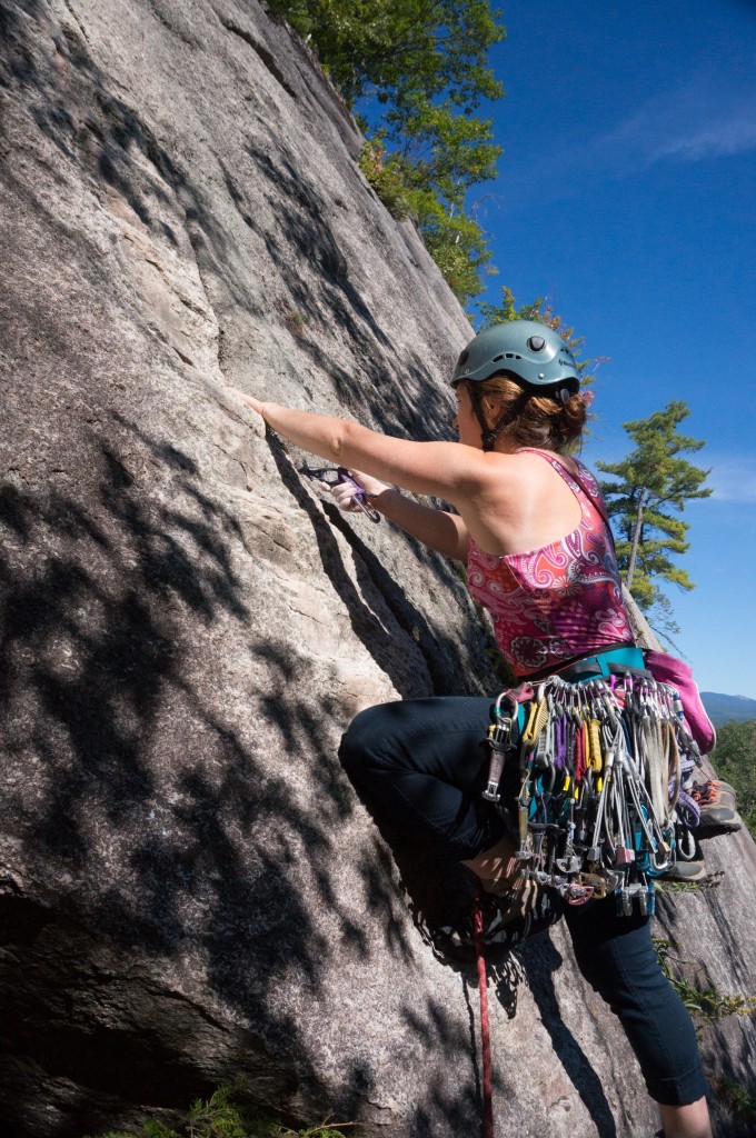 The Venus harness comfortably holds a full rack of cams right where Lilly wants them for splitter granite on Cathedral Ledge, New Hampshire Photo Drew Thayer